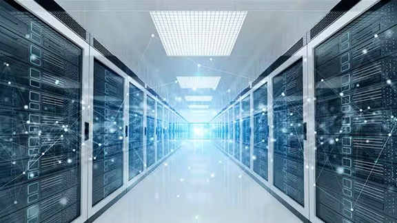 A long hallway lined with servers and data lines